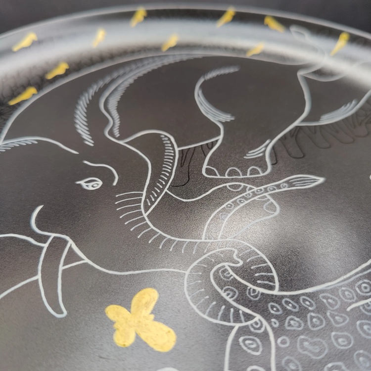Decorative ceramic plate "Elephant and Cheetah" from the series "The Chase".