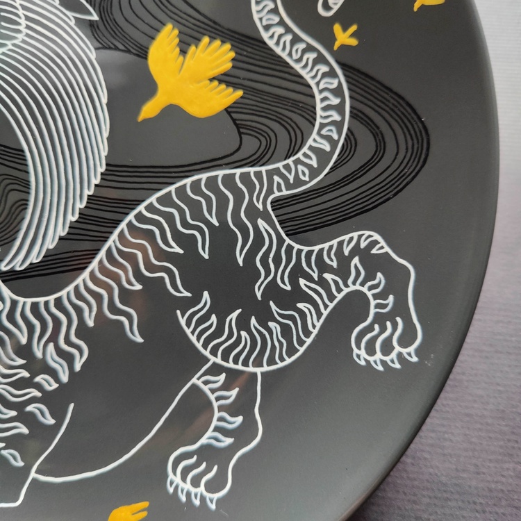 Decorative ceramic plate "Heron and Tiger" from the series "The Chase".