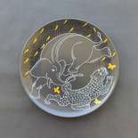 Decorative ceramic plate "Elephant and Cheetah" from the series "The Chase".