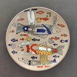 Decorative ceramic plate "L'amour" from the series "Fishdom".