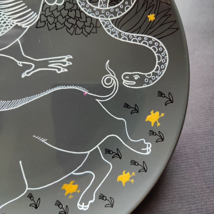 Decorative ceramic plate "Pig, Rooster, and Snake" from the series "The Chase"