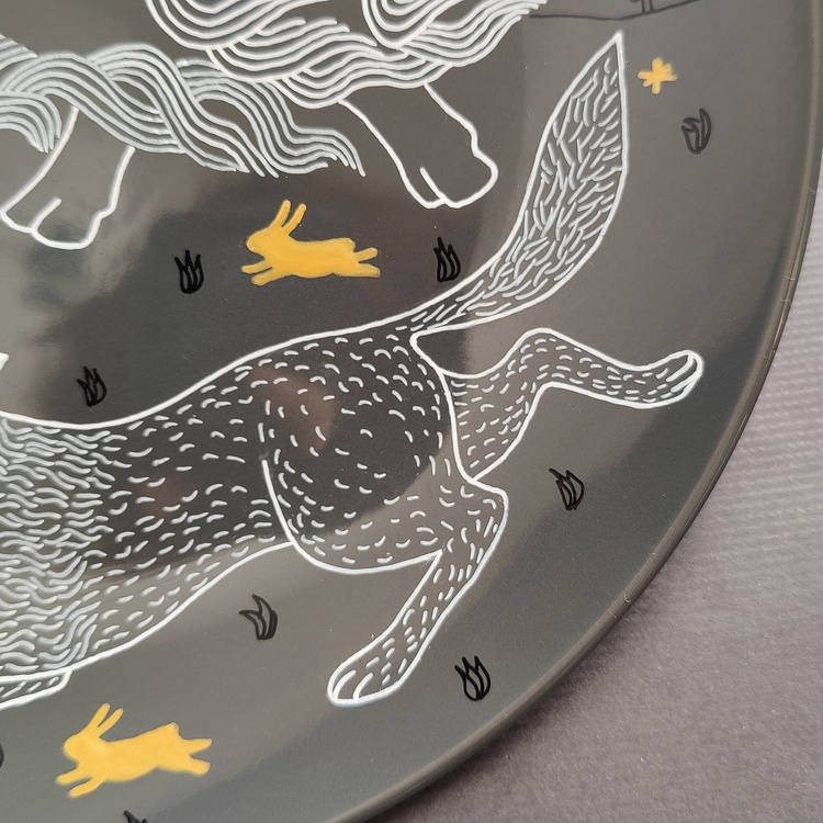 Decorative ceramic plate "Yak and Wolf" from the series "The Chase"
